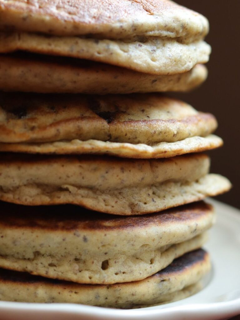stack of chocolate chip pancakes on a plate